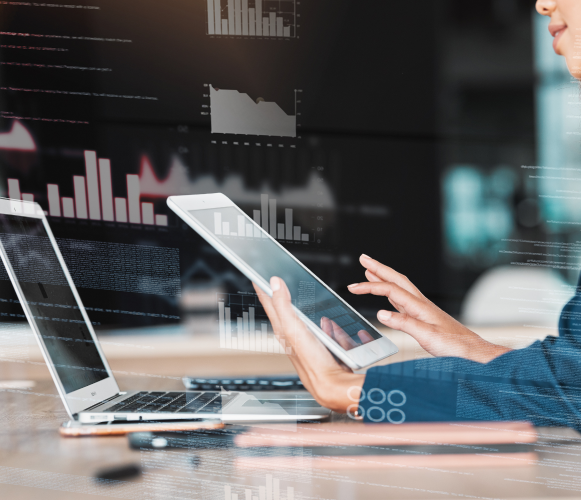 businesswoman-laptop-tablet-analytics-data-planning